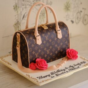 Elegant cake designed like a handbag with decorative roses for a special celebration.